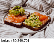 breakfast sandwiches with salmon avocado. Стоковое фото, агентство Ingram Publishing / Фотобанк Лори
