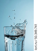clear glass with water. Стоковое фото, агентство Ingram Publishing / Фотобанк Лори