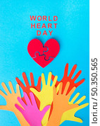 top view paper hands with puzzle paper heart. Стоковое фото, агентство Ingram Publishing / Фотобанк Лори