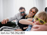 family 3d glasses looking camera. Стоковое фото, агентство Ingram Publishing / Фотобанк Лори