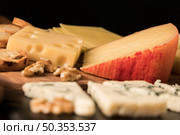 variation tasty cheeses wooden table. Стоковое фото, агентство Ingram Publishing / Фотобанк Лори