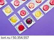 flat lay arrangement contraception concept purple background. Стоковое фото, агентство Ingram Publishing / Фотобанк Лори