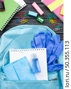 top view back school stationery with backpack notebook. Стоковое фото, агентство Ingram Publishing / Фотобанк Лори