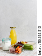 arrangement with packed food juice bottle. Стоковое фото, агентство Ingram Publishing / Фотобанк Лори