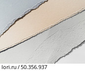 pastel colored diagonal paper tears. Стоковое фото, агентство Ingram Publishing / Фотобанк Лори
