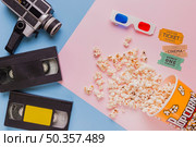 videotape with vintage videocamera popcorns. Стоковое фото, агентство Ingram Publishing / Фотобанк Лори