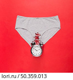 top view knickers with sequins clock. Стоковое фото, агентство Ingram Publishing / Фотобанк Лори