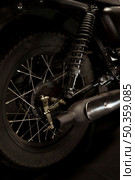 wheels cafe racer style motorbike. Стоковое фото, агентство Ingram Publishing / Фотобанк Лори