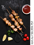 cooked meat veggies kebab with ketchup. Стоковое фото, агентство Ingram Publishing / Фотобанк Лори