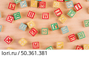 wooden bright cubes scattered floor. Стоковое фото, агентство Ingram Publishing / Фотобанк Лори