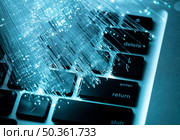 blue optic fiber with laptop. Стоковое фото, агентство Ingram Publishing / Фотобанк Лори