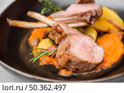 grilled lamb ribs close up. Стоковое фото, агентство Ingram Publishing / Фотобанк Лори