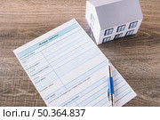 paper mortgage request table. Стоковое фото, агентство Ingram Publishing / Фотобанк Лори