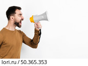 angry man screaming megaphone. Стоковое фото, агентство Ingram Publishing / Фотобанк Лори