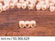 omg written wooden cubes. Стоковое фото, агентство Ingram Publishing / Фотобанк Лори