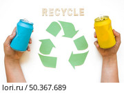 hands with cans recycle lettering with logo. Стоковое фото, агентство Ingram Publishing / Фотобанк Лори