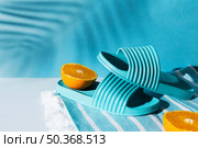 arrangement with flip flops orange. Стоковое фото, агентство Ingram Publishing / Фотобанк Лори