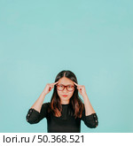 asian woman reading mind. Стоковое фото, агентство Ingram Publishing / Фотобанк Лори