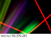 red neon lines colorful laser light dark background. Стоковое фото, агентство Ingram Publishing / Фотобанк Лори