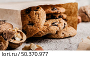crumbled paper with delicious cookies. Стоковое фото, агентство Ingram Publishing / Фотобанк Лори