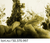 dark khaki ink cloud diffusing. Стоковое фото, агентство Ingram Publishing / Фотобанк Лори