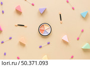eye shadows with applicators beige table. Стоковое фото, агентство Ingram Publishing / Фотобанк Лори
