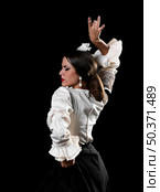 lady dancing flamenco with arm up. Стоковое фото, агентство Ingram Publishing / Фотобанк Лори