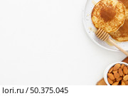 top view delicious crepes with honey copy space. Стоковое фото, агентство Ingram Publishing / Фотобанк Лори