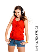 Beutiful girl listen music isolated on white. Стоковое фото, агентство Ingram Publishing / Фотобанк Лори