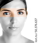 Face of a young beautiful woman with a great blue eyes. Partially desaturated image to focus the atention on the eyes of the model. Стоковое фото, агентство Ingram Publishing / Фотобанк Лори