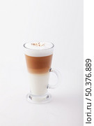 cup of hot latte on white background. Стоковое фото, агентство Ingram Publishing / Фотобанк Лори