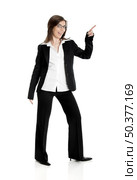 Full body portrait of happy beautiful business woman isolated on white Pointing to somewhere. Стоковое фото, агентство Ingram Publishing / Фотобанк Лори