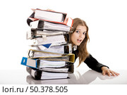 Business Woman in the office over-worked isolated on white. Стоковое фото, агентство Ingram Publishing / Фотобанк Лори