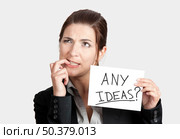 Business woman biting the nails and holding a card board with the text message "Hire me" Стоковое фото, агентство Ingram Publishing / Фотобанк Лори