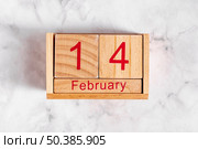 14 february wooden calendar. Стоковое фото, агентство Ingram Publishing / Фотобанк Лори
