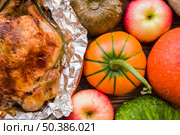 baked chicken foil with vegetables. Стоковое фото, агентство Ingram Publishing / Фотобанк Лори