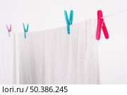 close up bath towel hanging clothesline. Стоковое фото, агентство Ingram Publishing / Фотобанк Лори