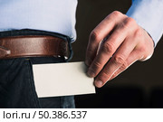 crop man taking out business card. Стоковое фото, агентство Ingram Publishing / Фотобанк Лори