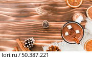 hot chocolate with marshmallow wooden background. Стоковое фото, агентство Ingram Publishing / Фотобанк Лори