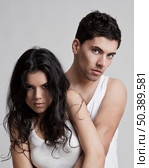 Sexy young couple isolated on a gray background. Стоковое фото, агентство Ingram Publishing / Фотобанк Лори