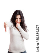 Girl with thumbs down, isolated against a white background. Стоковое фото, агентство Ingram Publishing / Фотобанк Лори