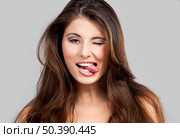 Studio portrait of a beautiful and expressive young woman. Стоковое фото, агентство Ingram Publishing / Фотобанк Лори