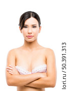 Beautiful asian woman in lingerie, isolated over white background. Стоковое фото, агентство Ingram Publishing / Фотобанк Лори