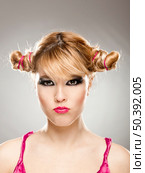 Close-up portrait of a cute blonde woman doing a pout expression. Стоковое фото, агентство Ingram Publishing / Фотобанк Лори