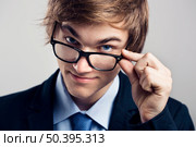 Portrait of a handsome business man wearing glasses. Стоковое фото, агентство Ingram Publishing / Фотобанк Лори