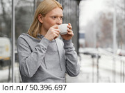 medium shot woman drinking from cup 3. Стоковое фото, агентство Ingram Publishing / Фотобанк Лори