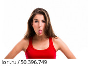 Beautiful young woman throwing tongue out, isolated over white background. Стоковое фото, агентство Ingram Publishing / Фотобанк Лори