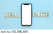 mobile with fake news letters. Стоковое фото, агентство Ingram Publishing / Фотобанк Лори