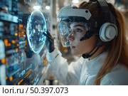 A modern female scientist or engineer in a high-tech helmet and protective gear interacts with a holographic interface in a laboratory or research environment. On the screen in front of her is a glowing digital globe with data and graphs. The atmosphere of the image is futuristic, with an emphasis on future technologies, innovations and artificial intelligence. A striking example of the concept of high-tech professions and scientific developments. Стоковое AI-изображение, AI-художник Анна Кривицкая / Фотобанк Лори