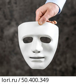 composition with white serious mask. Стоковое фото, агентство Ingram Publishing / Фотобанк Лори